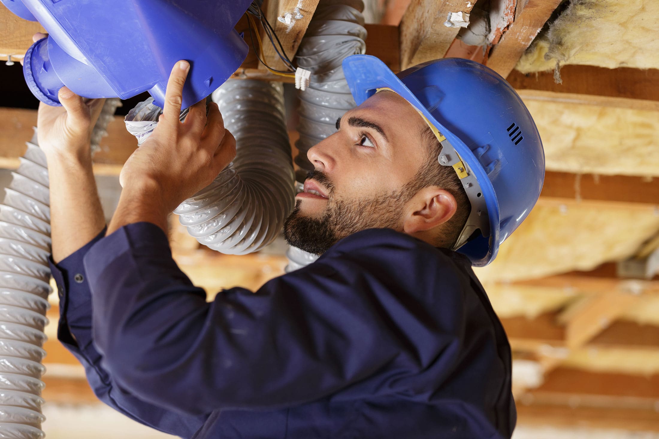 HVAC man testing pipes