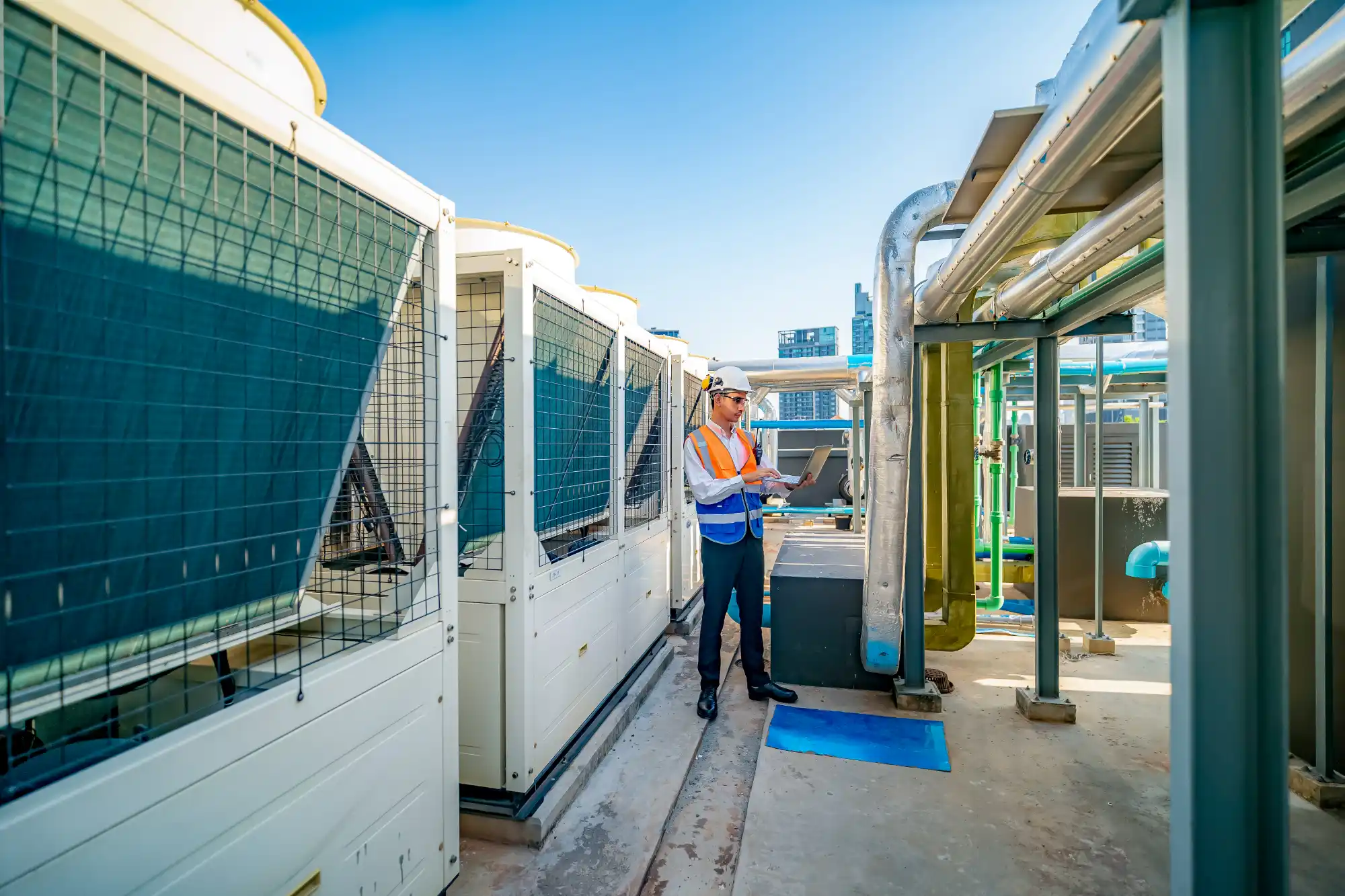 SITA technician performing HVAC commissioning on air handling unit in a Central Florida commercial building